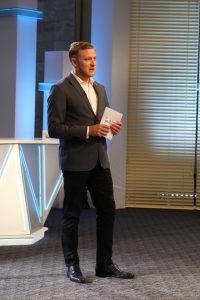 World Learning Algeria Field Director stands in front of contestants during filming for the new reality TV show