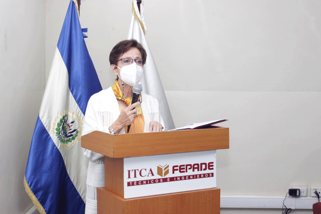 Elsy Escolar Santo Domingo speaks at a podium